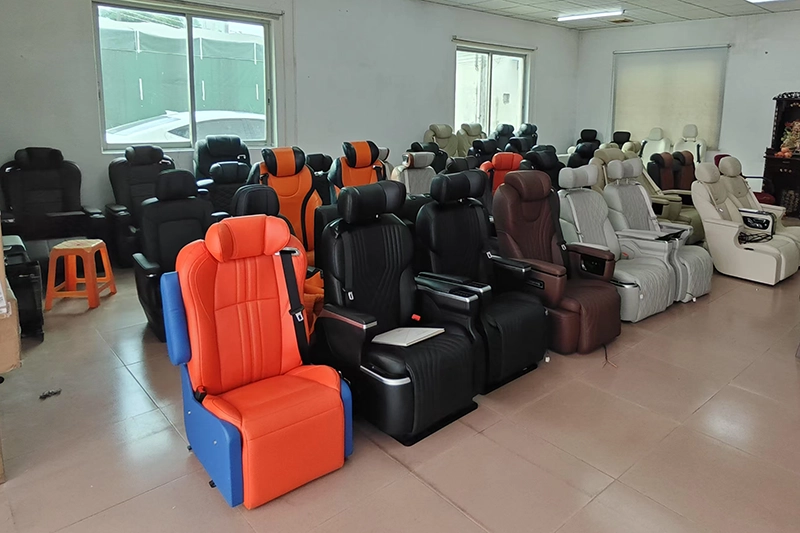 Modern showroom of a premier luxury car seats manufacturer featuring a diverse range of premium automotive seating models