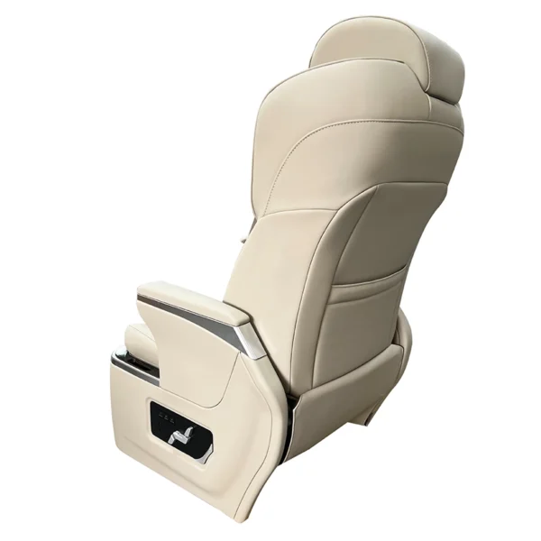 Beige leather grandia captain seat rear back display with smooth curve and side control panel
