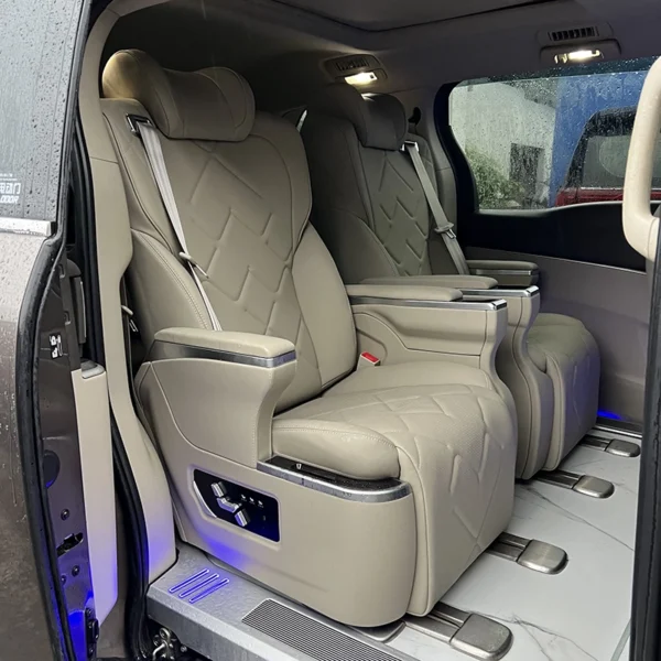 Beige leather grandia captain seat finished installation display inside Grandia van cabin