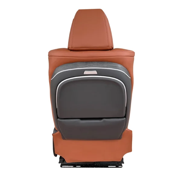 Rear shot of brown leather car driver seat equipped with built-in foldable back table