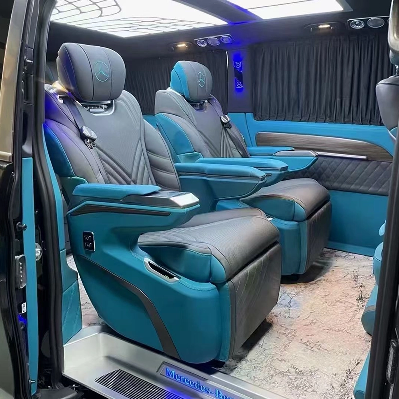 Luxury Sprinter captain seats installed in a custom-colored van interior, featuring premium upholstery and a cohesive high-end design.