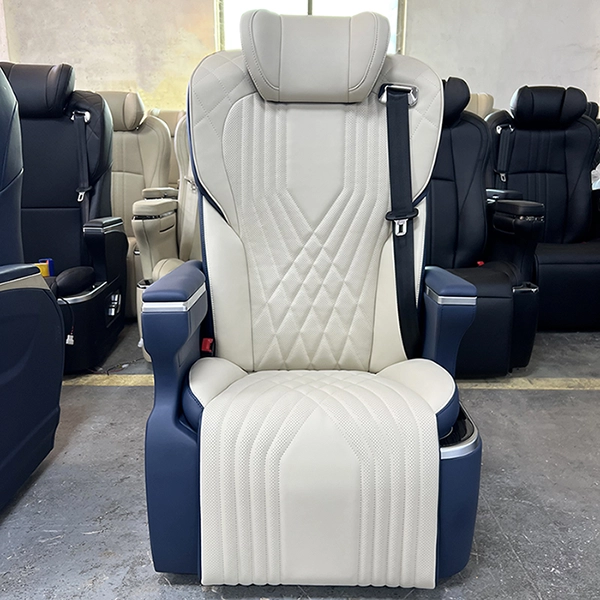 Front view of a luxury two-tone captain seat in car with custom color options and large backrest design