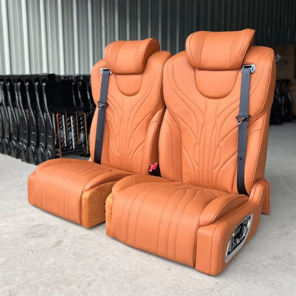 A pair of luxury driver and passenger seats featuring electric forward, backward, and backrest adjustment.
