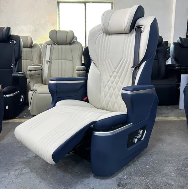 Close up of the electric leg rest feature on a luxury captain seat in car