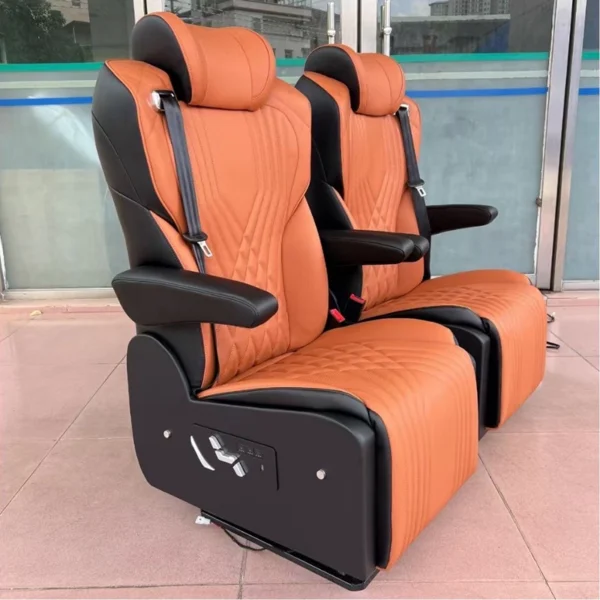 Side outdoor shot of dual two-tone leather Hiace van captain seats, diamond quilt stitching, movable armrest, side physical key control switch and built-in safety belts