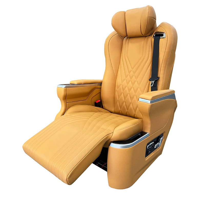 Close-up of an Innova captain seat in orange leather with the electric leg rest fully extended for ergonomic leg support.