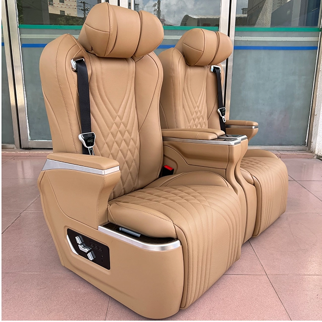 Side view of Kia Carnival captain seats featuring a new electric control panel for adjustable seating and luxury comfort.