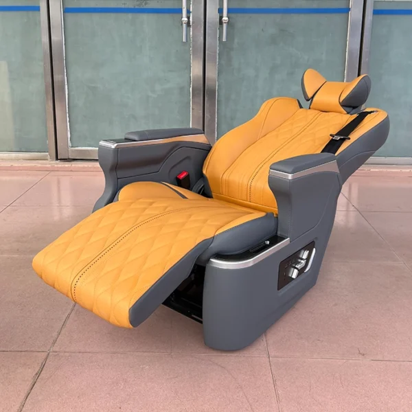 Premium orange luxury auto seats shown in full recline position with electric leg rest for van interior upgrade.
