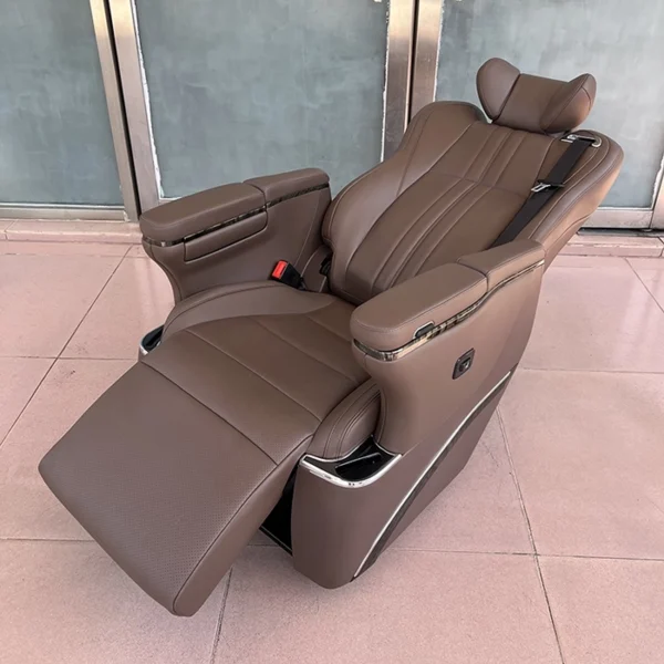 Premium captain seats showing fully extended leg rest and reclined back position
