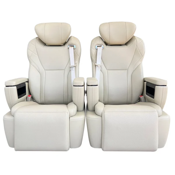 A pair of luxury car seat design models in beige leather, showcasing a modern and symmetrical layout for MPVs.