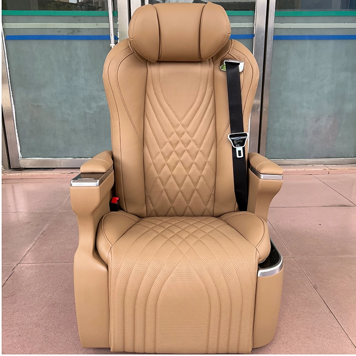 Front view of premium Kia Carnival captain seats featuring luxury tan leather and an elegant diamond-stitched design.