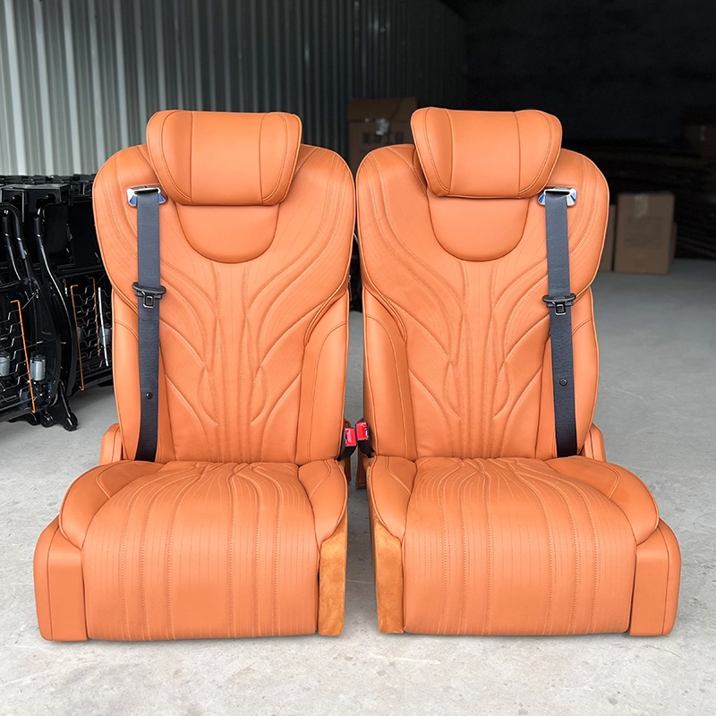 A pair of premium leather driver and passenger seats with ergonomic design for commercial vehicles.