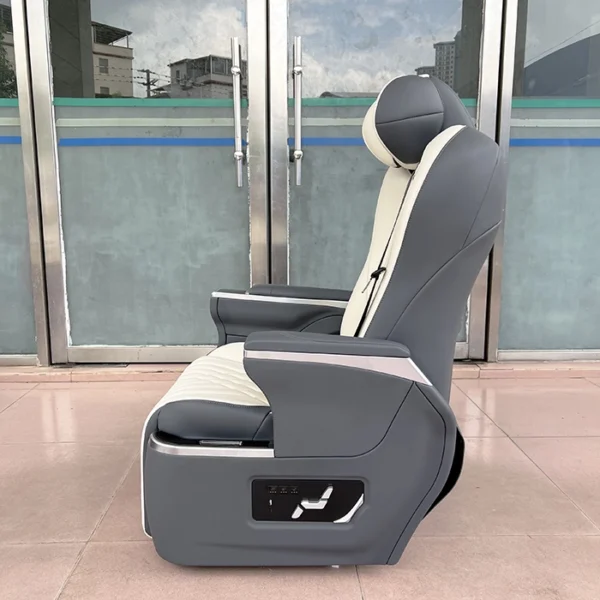 Luxury seats in car side view showing electronic control buttons