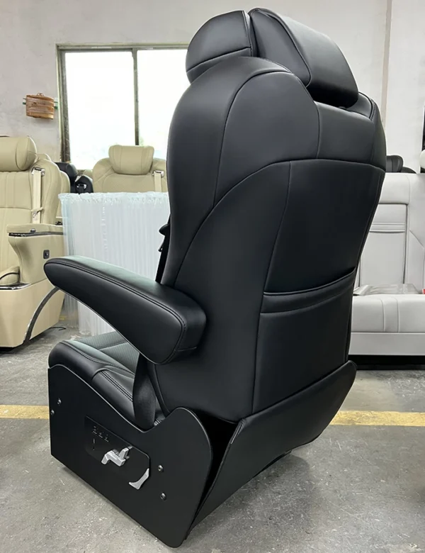 Premium black leather luxury van seats, ergonomic curved backrest design with neat stitching and side control panel