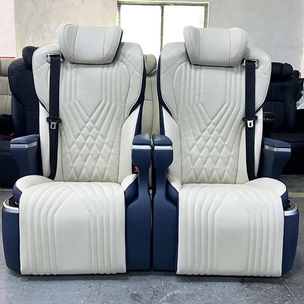 Front view of a pair of luxury two-tone captain seat in car units