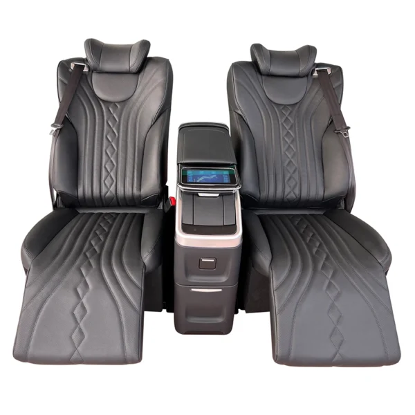 Black leather two-seater rear seat of car fully extended with electric leg rests and adjustable electric backrest, touch screen center console