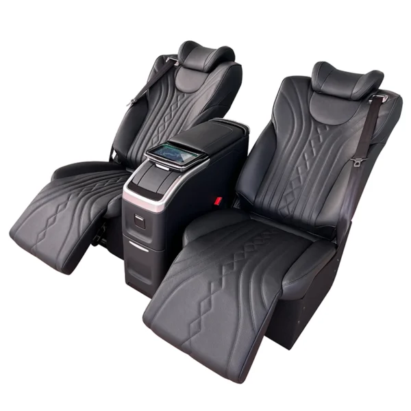 Black leather twin rear seat of car side view with fully extended leg rests and fully laid flat reclining backrest, touch screen center console