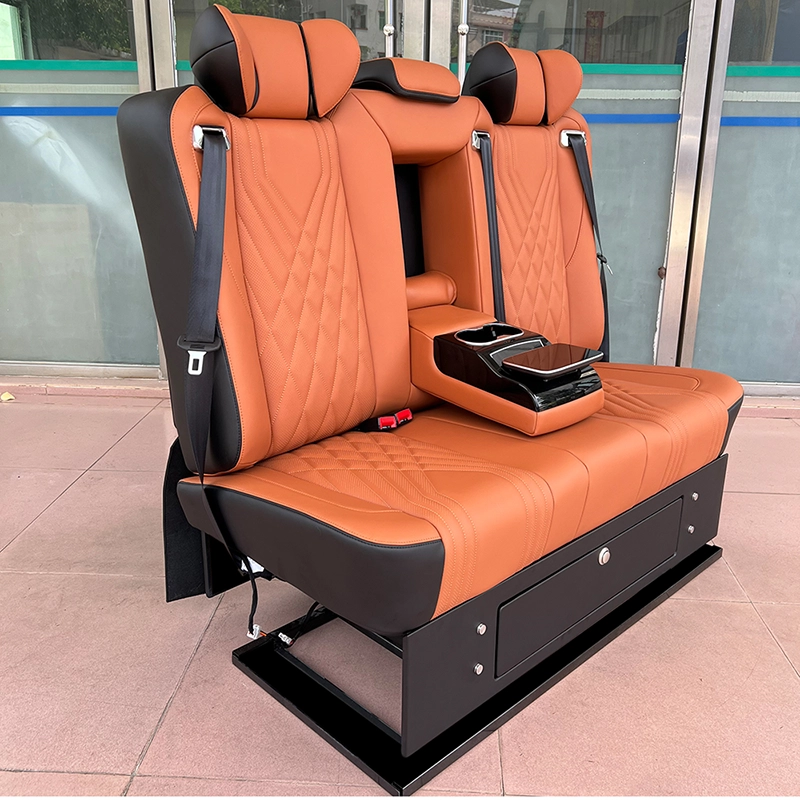 Side shot of dual-passenger leather car back seat equipped with lockable storage box at base
