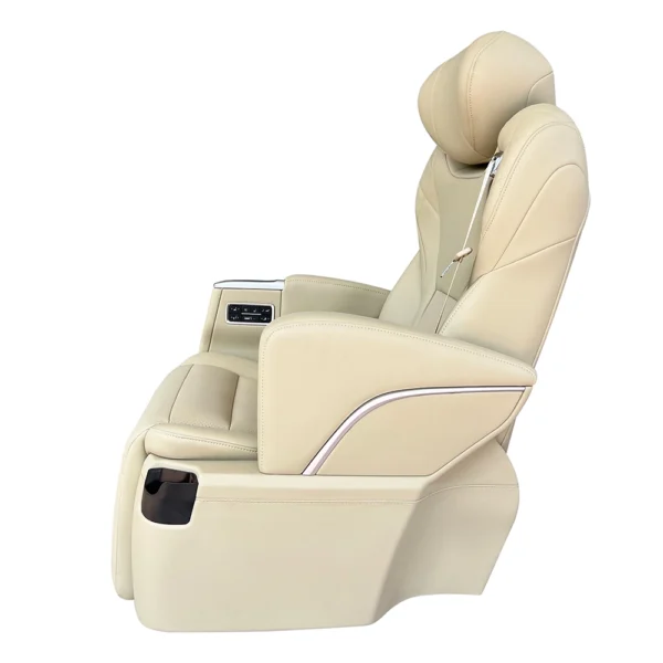 Side view of Toyota Grandia captain seat showing wide leather armrest with control panel and cup holder