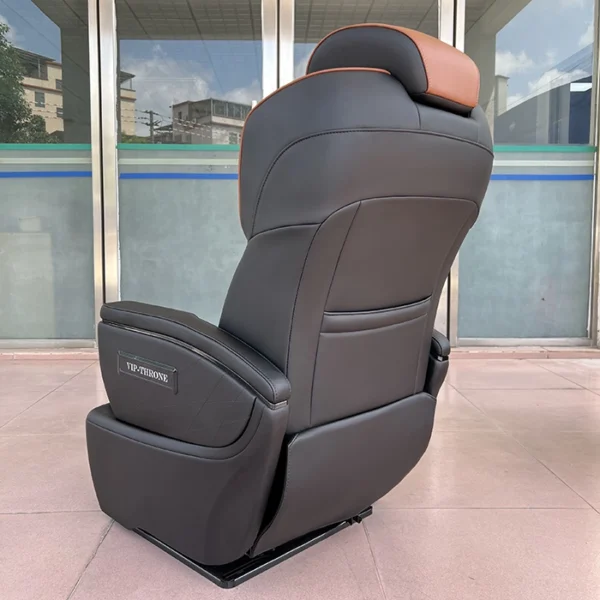 Back side view of Toyota Hiace van seats featuring premium black leather and storage pockets.