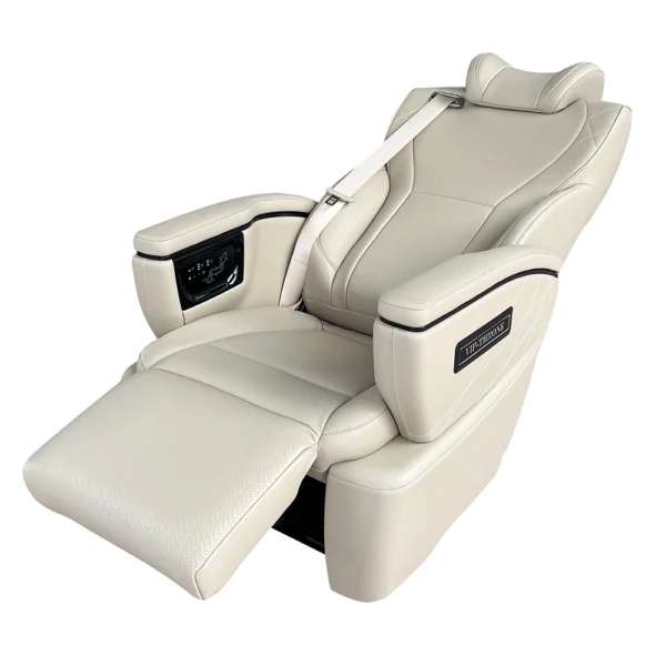 Side shot of leather van luxury seats in 160-degree full flat mode with extended leg rest