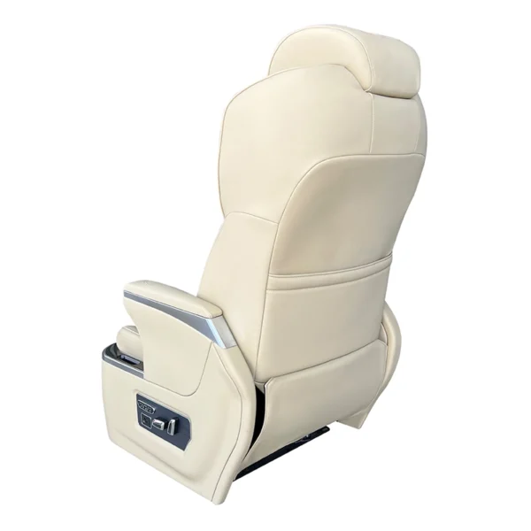 The backrest and rear view of a luxury VIP captain seat in beige leather, featuring a built-in storage pocket and a side-mounted electric control panel.
