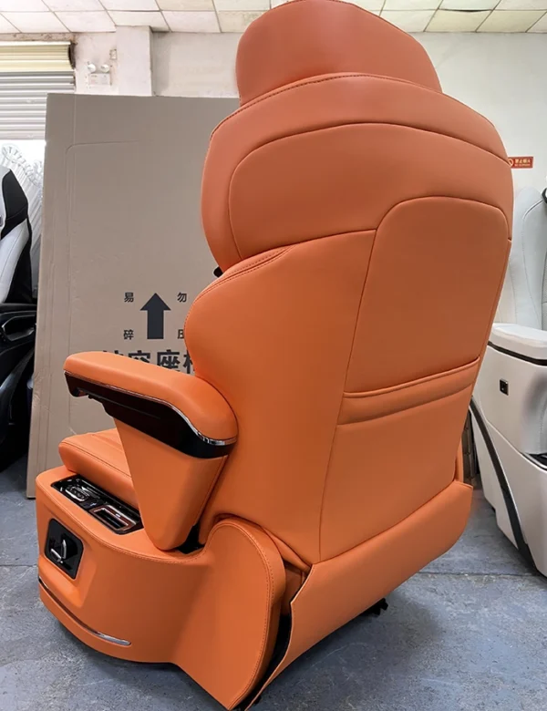 Back view of the orange leather captain seat van showing design