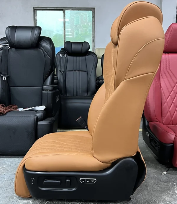 Side profile view of a luxury car passenger seat featuring integrated physical control buttons for electric adjustments, heating, and ventilation.