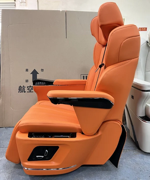 Side view of captain seat van with activity armrest and control panel